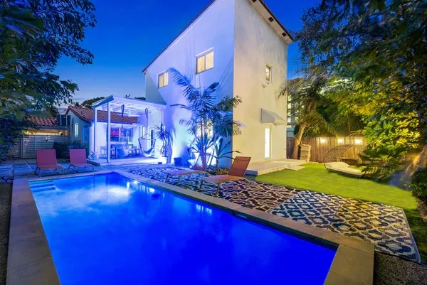 Miami villa pool at night